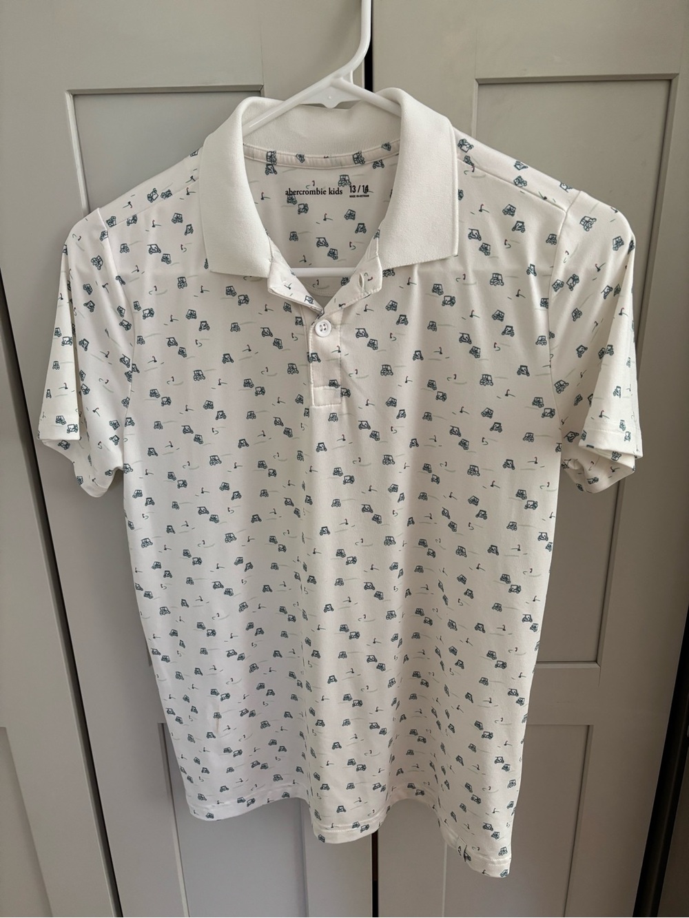 Abercrombie kids white polo with golf cart print
